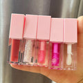 Wholesale Hot Selling Glitter Lip Plump Oil Private Label Fruit Flavor Color Changing Vegan Moisturizing Lip Plumper Oils