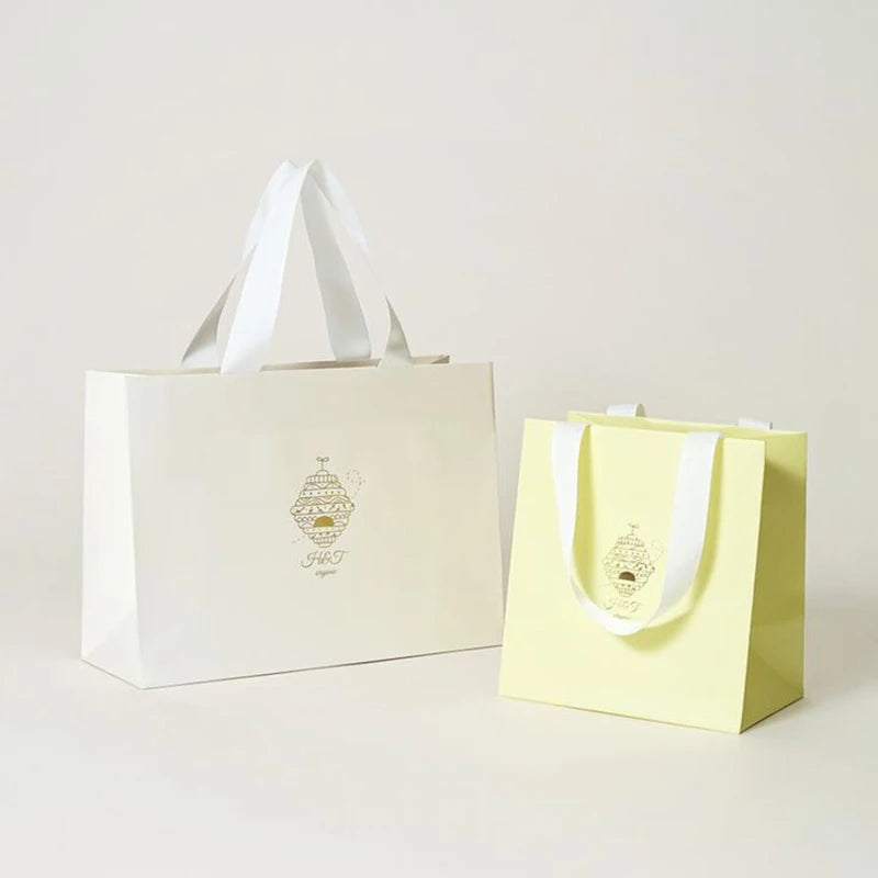 China Manufacturer White Luxury Printed Gift Paper Bag Custom Die Cut Design Retail Shopping Paper Bags With Your Own  Logo