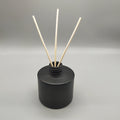 Luxury 100ml Matte Black Glass Reed Diffuser Bottle Wholesale Empty Round Perfume Bottle for Home Fragrance Aromatherapy