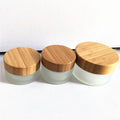 Skin Care Plastic 5g 15g 30g 50g 100g Glass Cream Jar With Wood Grain Plastic Cap Bamboo Jar 30ml 50ml 100ml 120ml 150ml Bottles