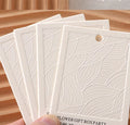 Wholesale Custom Luxury Brand Eco-Friendly 600g Cotton Paper Hang Tags Embossed Logo for Clothe Garment