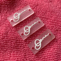 Waterproof Sewing Holes Transparent Rubber Label for Swimsuitlittle Size clear Silicone Rubber Tags for Swimwear