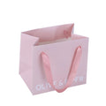 Promotional Luxury Pink Recycled Art Paper Gift Bags with Ribbon Handle and Logo Printed Embossed Small Custom Craft Bags