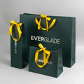 Wholesale Custom Emerald Green Printed Luxury Shopping Gift Paper Bag with Handle and Bow luxury Paper Bags with Your Own logo