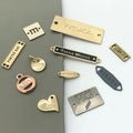 Supplier Wholesale Clothing Accessory Custom Engraved Brand logo Sew Metal  Tag for Garments / Swimwear