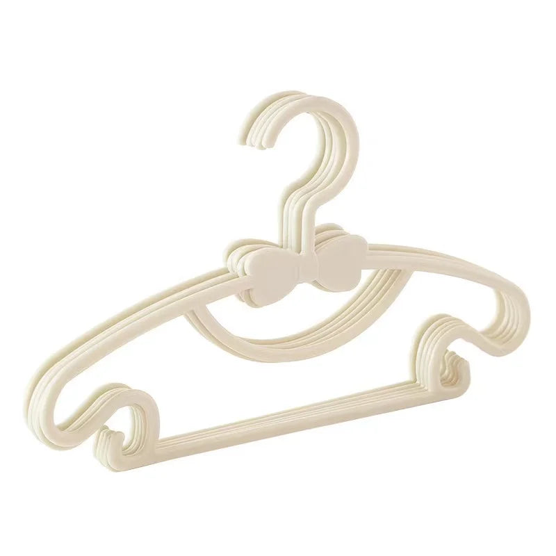 Hot Sale Portable Plastic Toddler Infant Clothes Hangers Cute Bowknot Children Hangers Closet Organizer Baby Hangers