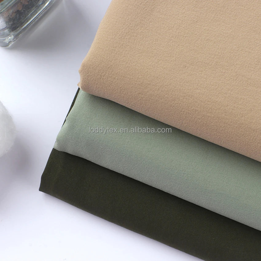 Stock 70D Nylon Spandex 4 Way Stretch Fabric Breathable Waterproof Lightweight for Sports Pants & Swimwear Girls