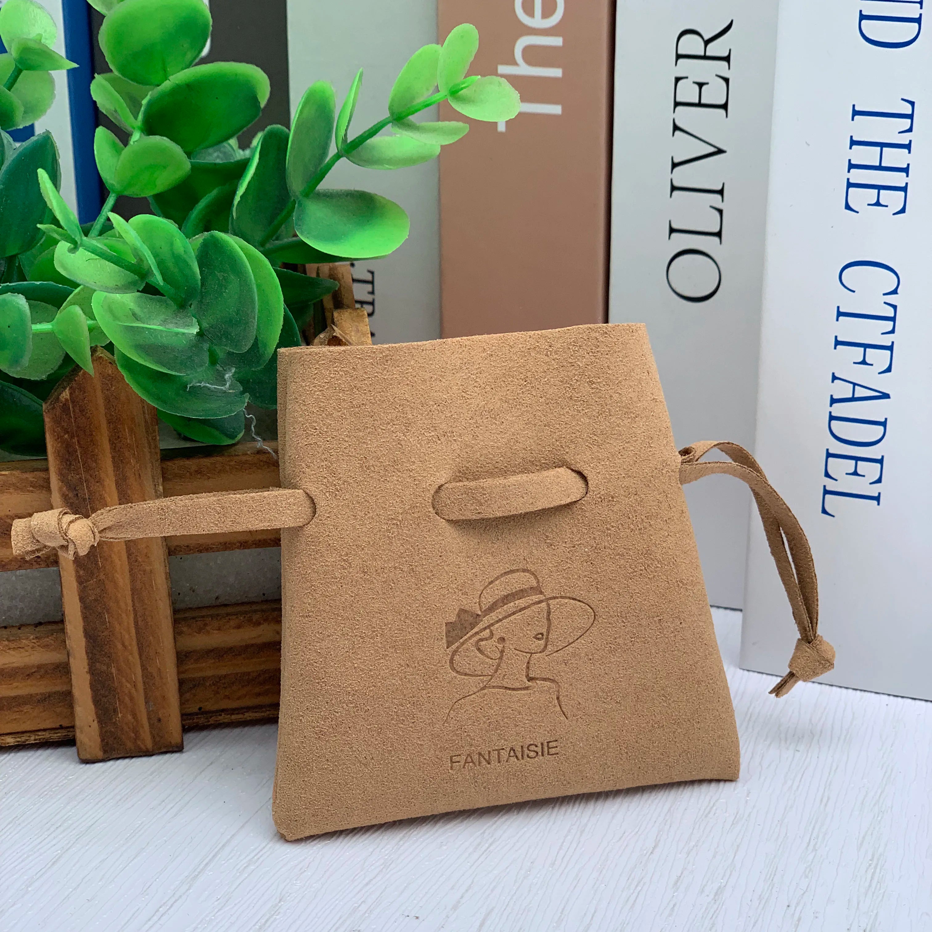 JUNE Fashion Drawstring Suede Microfiber Jewelry Dust Pouch Bag with Deboss Logo for Earrings Necklace and Bracelet