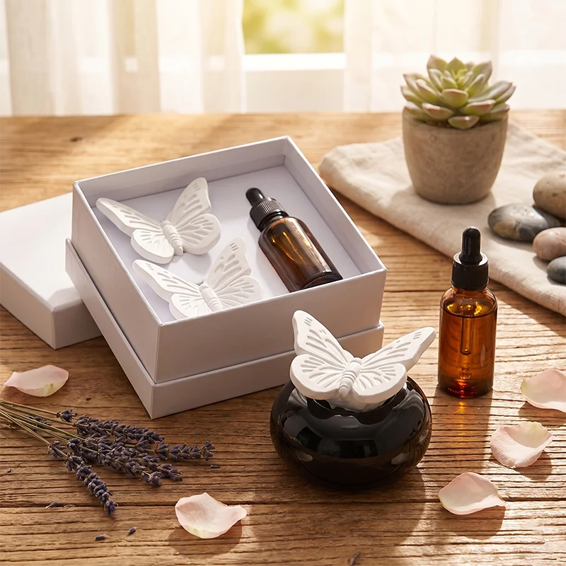 Ceramic flower butterfly shape aromatreatment vaporizer reed diffuser tabletop decoration gypsum flower cotton core