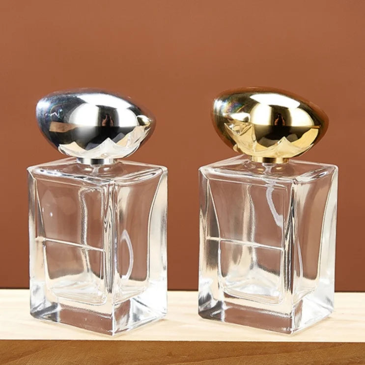 Wholesale   50ml Empty Long  Perfume Glass Bottle Thick Bottom  Crimp  Parfum Glass Bottles with Stone Shape Cap