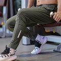 Wholesale Men's Elastic Pants Casual Trousers Sweat Fitness  Sports Custom logo Bestselling Jogger