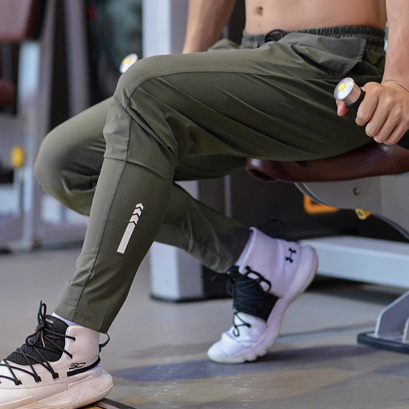 Wholesale Men's Elastic Pants Casual Trousers Sweat Fitness  Sports Custom logo Bestselling Jogger