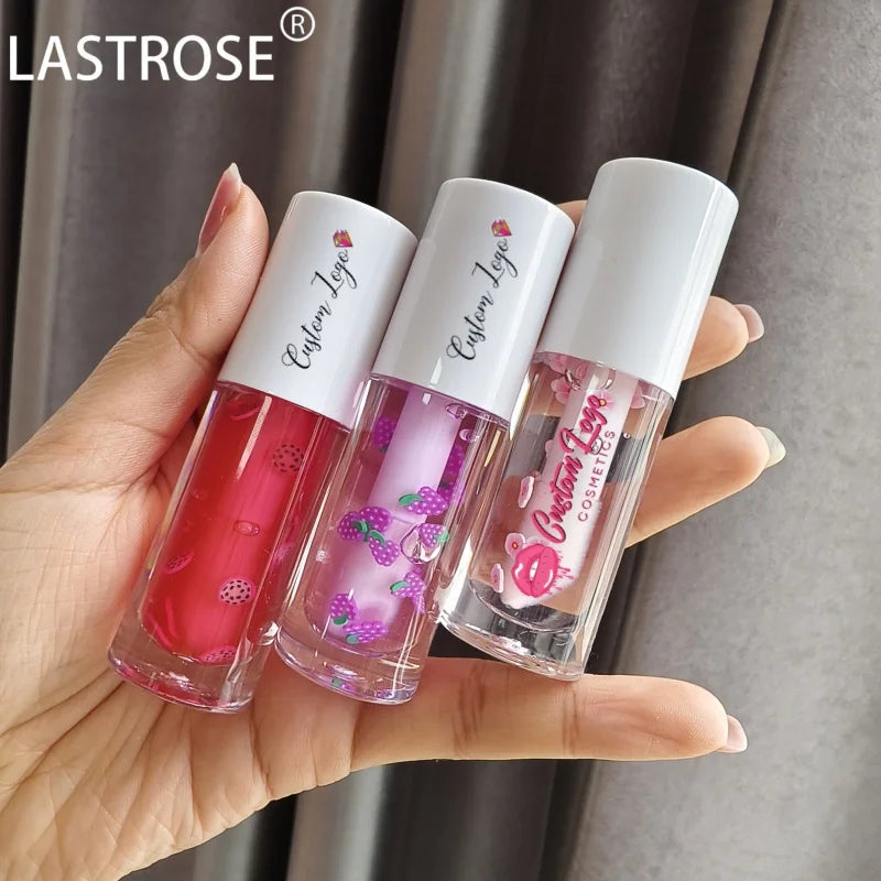 Wholesale 16 Flavors Vegan Long-Lasting Lip Oils Clear Moisturizing Lip Plumper Waterproof Feature Private Label Fruit Lip Gloss