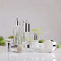 Luxury Glass Pump Bottle for Cosmetic Skin Care Lotion Package Screen Printing CROWN Cap