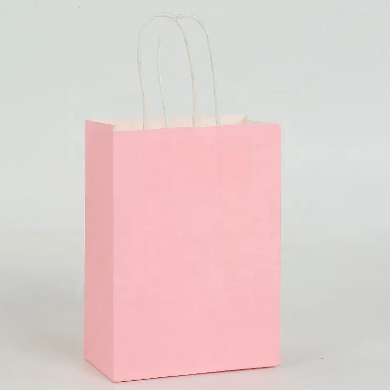 Custom Pink Kraft Paper Shopping Bags 8.27*4.33*10.63in Printed Biodegradable Material with Handle for Shopping Mall Use