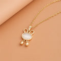 Wholesale New Korean Stainless Steel Luxury Simple Rabbit Necklace Cat Eye Stone Opal Necklace Charm
