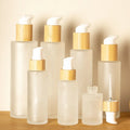 2025 New Design Frosted Glass Lotion Bottle 30ml/50ml Skin Care Serum & Facial Cleanser Container Bamboo Pump Head Pump Sprayer