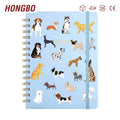 Dog Notebook with Ruled Pages of Dogs of Pink Background on the Cover Sized at 6.25" X 8.25"
