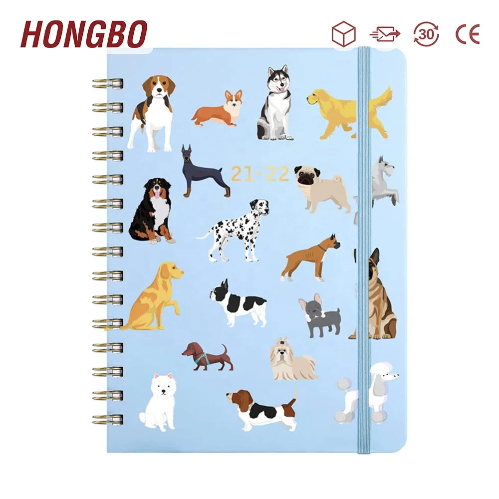 Dog Notebook with Ruled Pages of Dogs of Pink Background on the Cover Sized at 6.25" X 8.25"