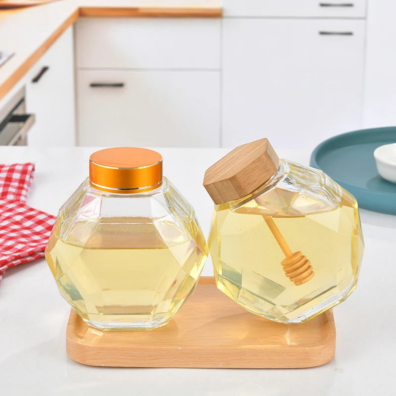 High Quality Factory Price Custom Shape Empty Hexagon Honey Packaging Glass Jar With Dipper