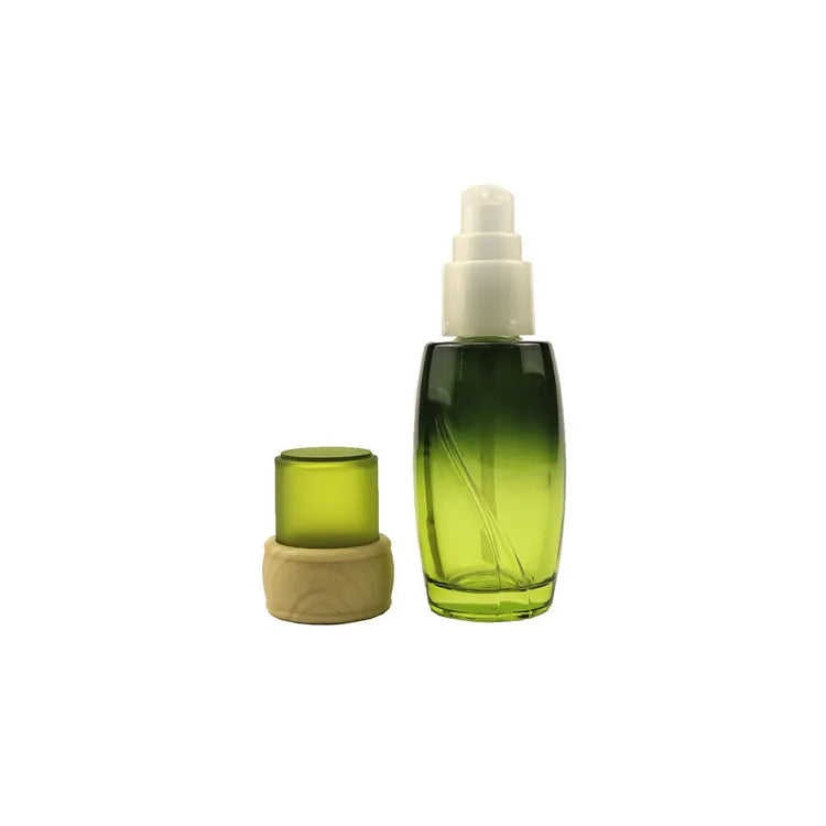 Hot Sale 40ml 100ml Green Color Glass Lotion Pump Bottle  Empty Essence Bottle