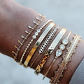 HOVANCI 7pcs Gold Plated Retro Crystal Tassel Bracelet Stackable Dainty Flower Bracelet Bangle