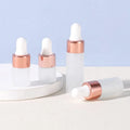 Hot Sale Rose Gold Series 1ml 2ml 3ml 5ml Frosted Glass Dropper Bottles Empty Cosmetic Sample Bottles for Essential Oil Perfume