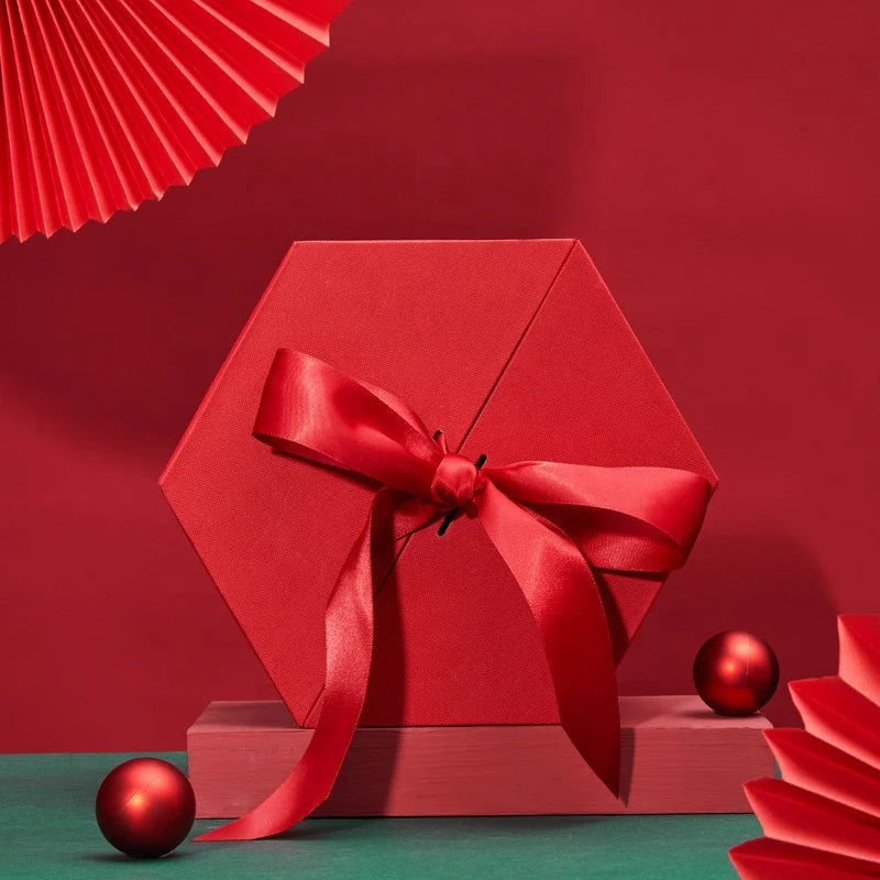 Elegant Hexagonal Rigid Cardboard Candy Box with Ribbon Closure UV Coating & Embossing Red Pink Gift Packaging for Weddings