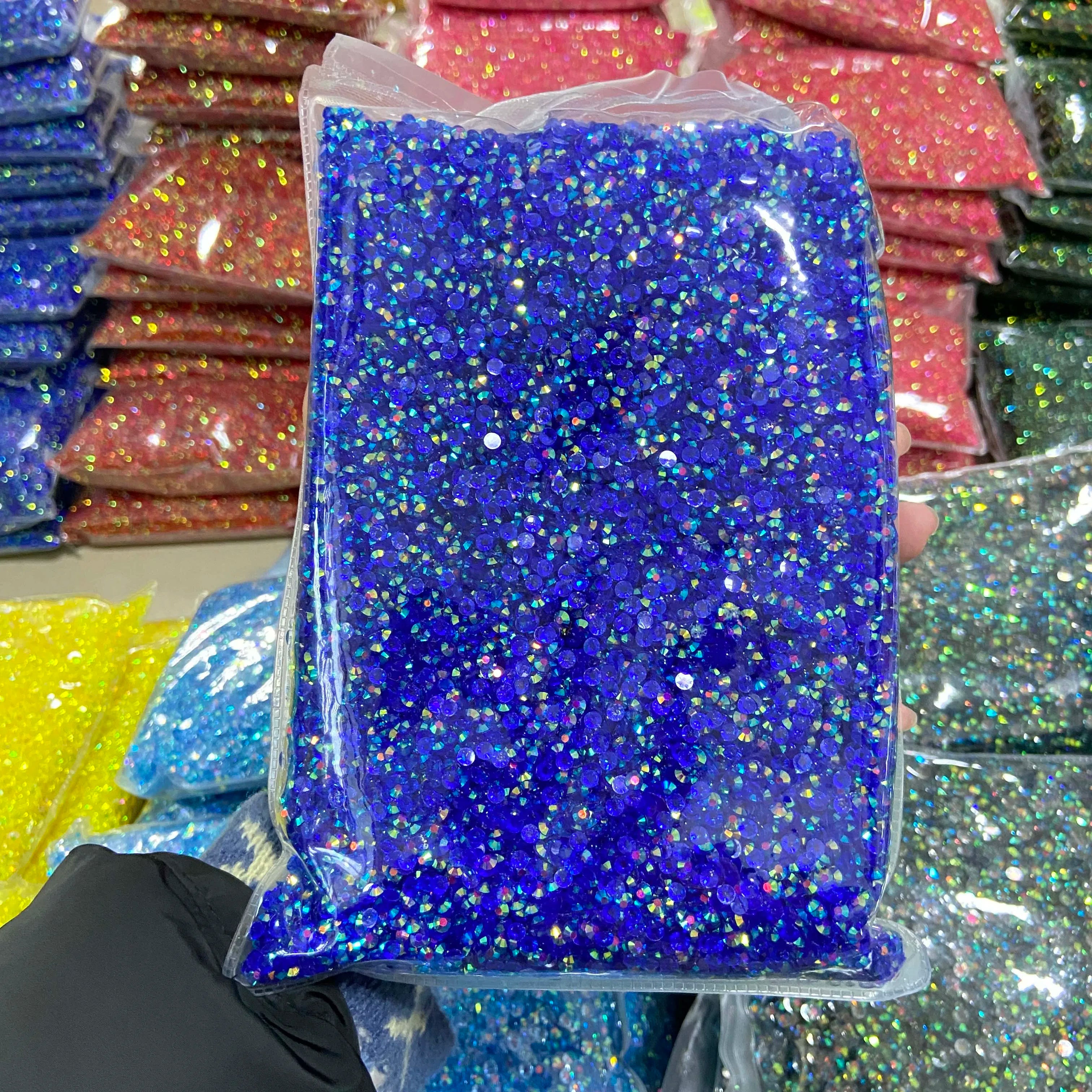 Xulin Wholesale 2mm 3mm 4mm 5mm 6mm Round Crystal Stones Transparent Bottom Flatback Resin Rhinestone for Diy Craft Decoration