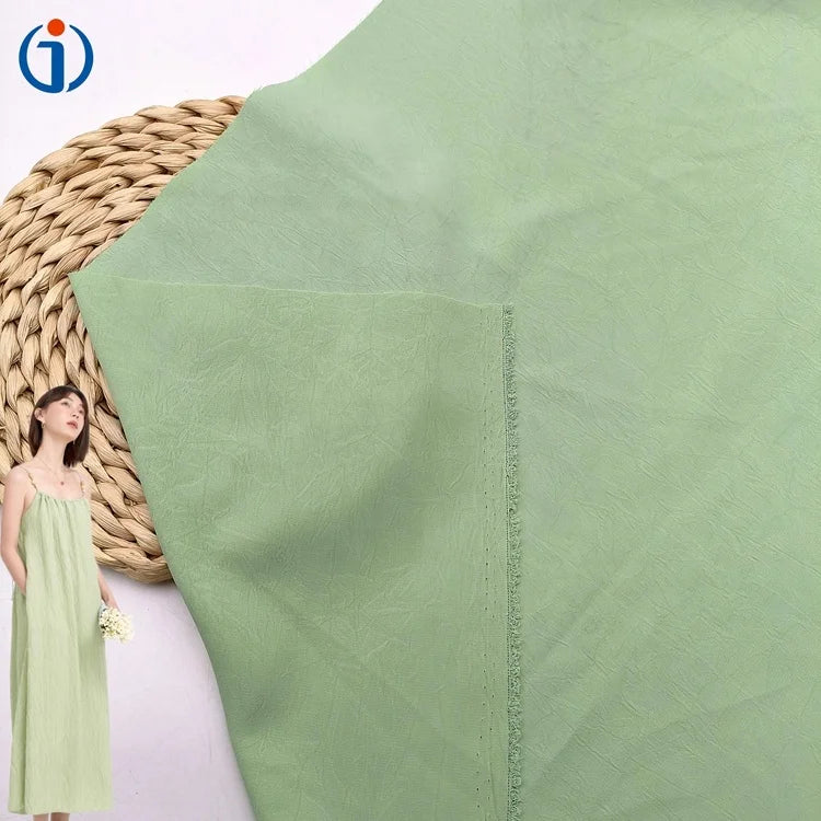 Shaoxing Textile 100% Polyester Woven Light Green Broken Twill Poka Crepe Pleated Fabric for Women Blouse