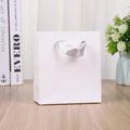 Matte Modern Cheap Stock Recycled Logo Solid Embossing Clothing Eco-Friendly Shopping Durable Paper Bag