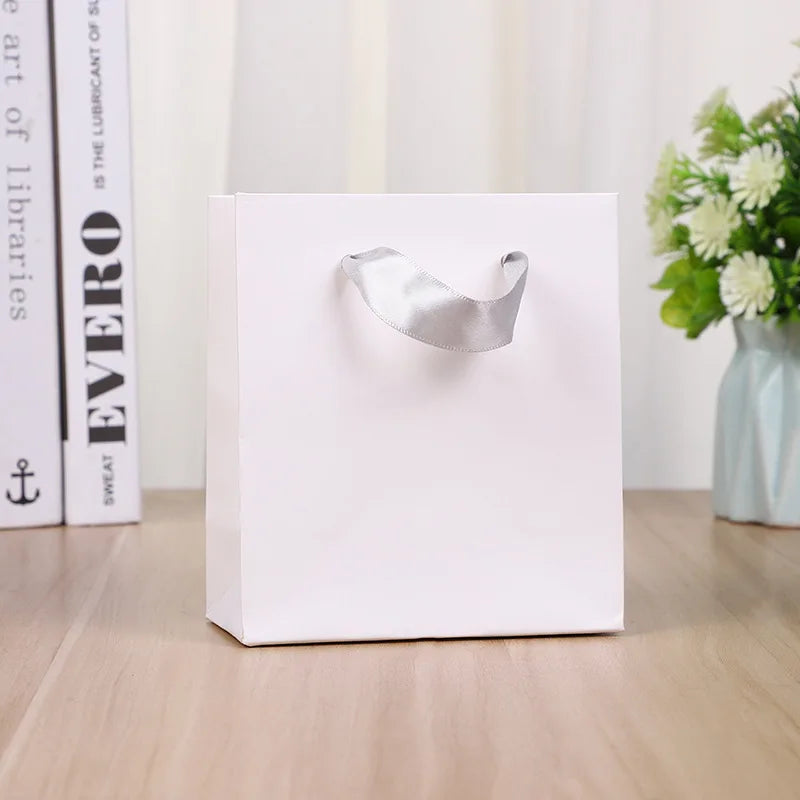 Matte Modern Cheap Stock Recycled Logo Solid Embossing Clothing Eco-Friendly Shopping Durable Paper Bag