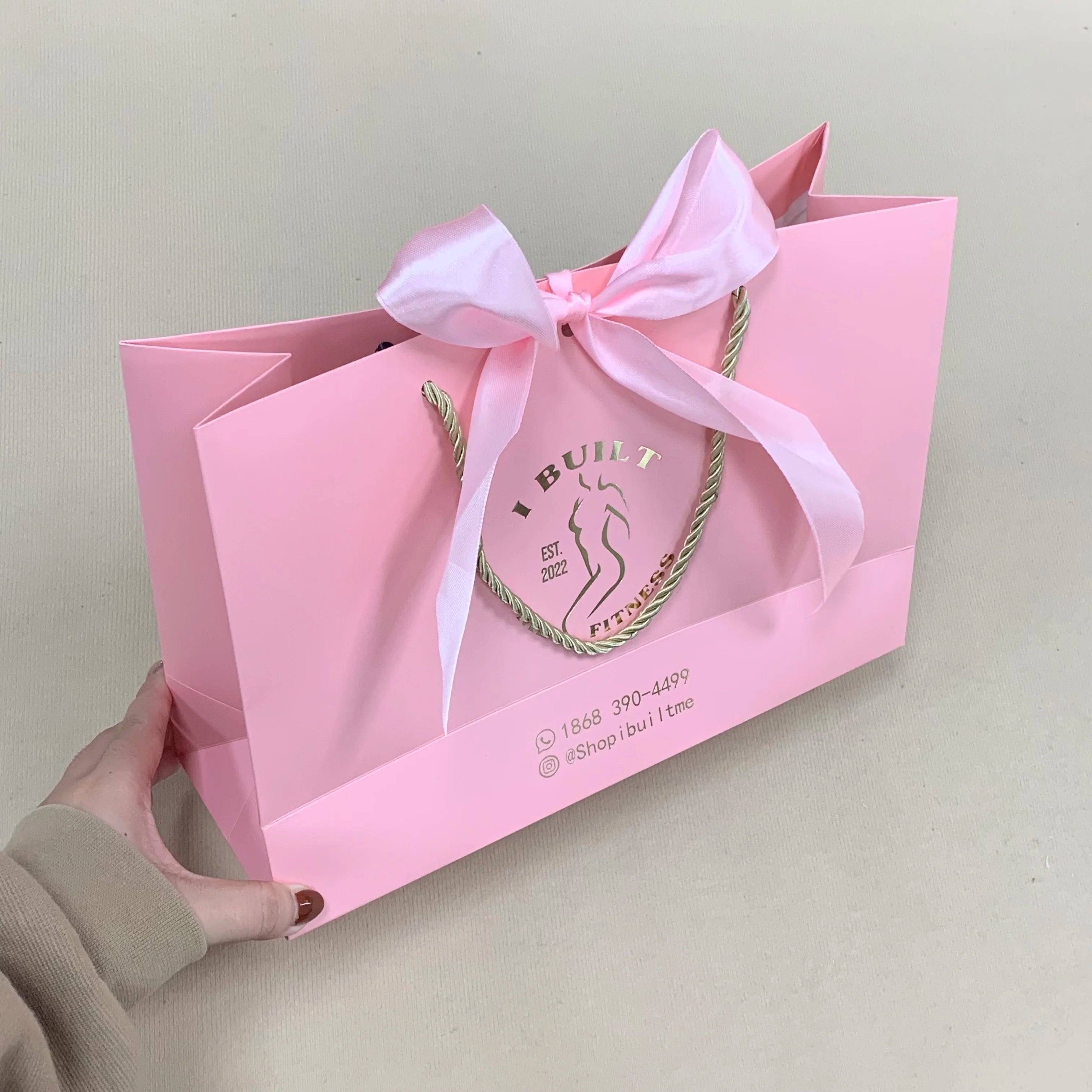 Wholesale Customized Wholesale Deluxe Handle Printed Shopping Clothing Branded Jewelry Clothing Gift Wrap Paper Bags with Logo