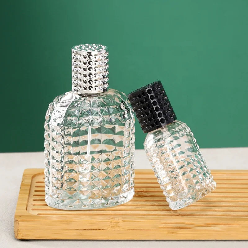 Wholesale Customized Portable Diamond 50ml 100ml Glass Perfume Bottles with Pump Sealer Refillable Sprayer