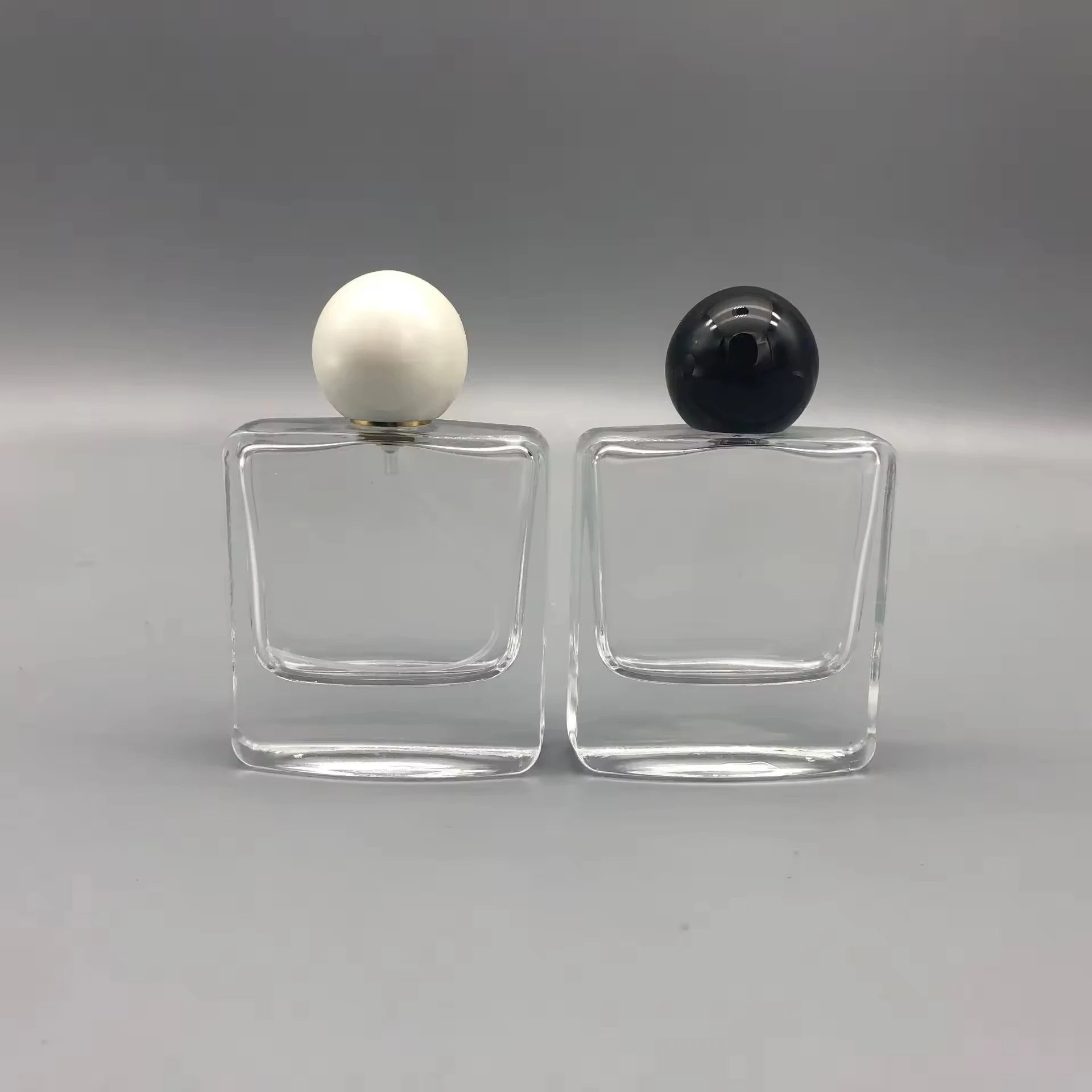 MUB Hot Sales 50ml Clear Flat  Easy Crimping Parfum Empty Bottle Fine Mist Perfume Bottle With Ball Cap