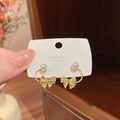 Design Fashion Stud Earrings Light Luxury Temperament Elegant Personalized Zircon Bow Pearl Earrings for Women Ear Claw