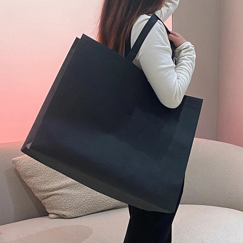 Customized logo Non-woven Oversized Shopping Bags Thickened Clothing and Home Textile Bags Large-capacity Enlarged Handbags