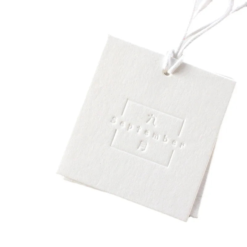 Luxury Custom Embossed Gold Foil UV Hang Tags Custom Logo Plastic Seal String for Bags Shoes Eco-Friendly Recyclable Paper