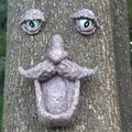 Hot Sale Funny Tree Face Resin Sculpture with Green Eyes & Curly Mustache Realistic Bark Texture for Outdoor Garden Decor