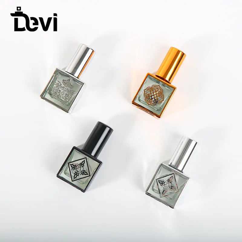 Devi Wholesales OEM/ODM Luxury Metallic Perfume Bottles 10ml/15ml/50ml Empty Glass Bottles in Carton for Sale