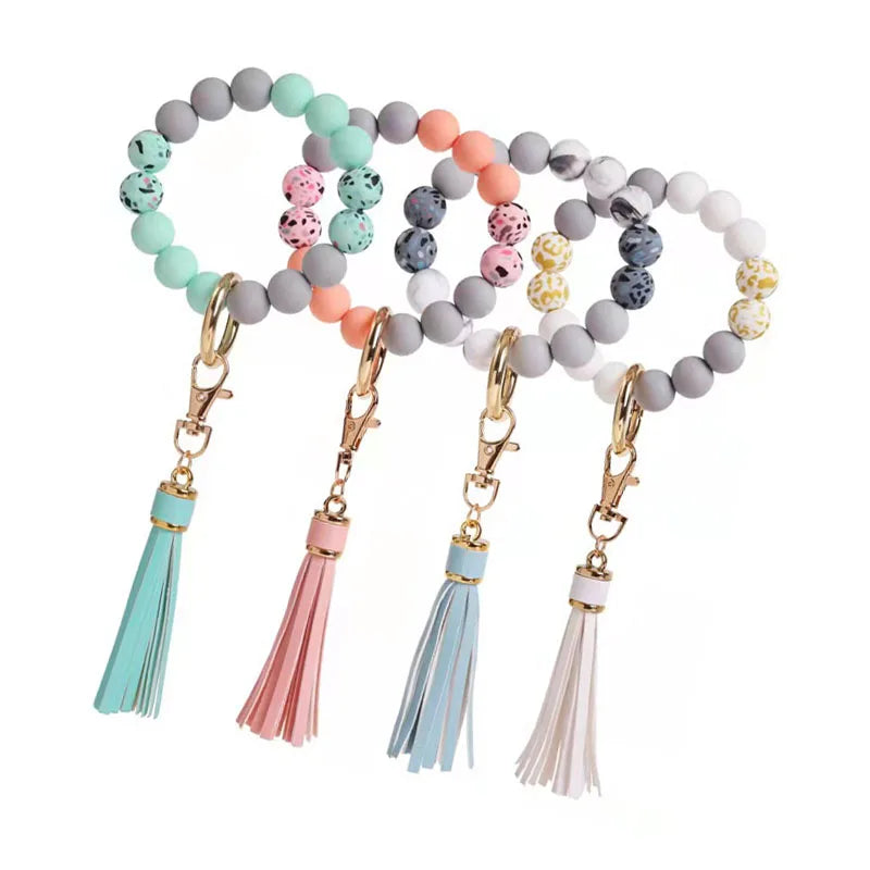 New Sezzle Anti-lost Wooden Bead Rubber Bracelet Leather Tassel Alloy Car Keychain Accessories 8*19cm