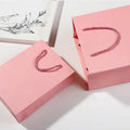 Manufacturers Wholesale Cheap White Kraft Paper Gift Bag Paper Bag Small Custom Paper Printing