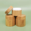 Empty 30ml 50ml 60ml 80ml 100ml 100% Organic Wood Bamboo Glass Jar/Bottle Cosmetic Packaging Lotion Biodegradable Cream Bottles