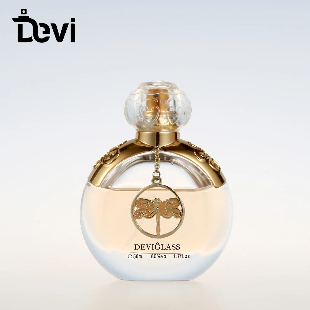 Devi Wholesale 100ml Luxury Hot Stamping Alloy Perfume Glass Bottle with Silver Cap and Carton Packing for Perfume