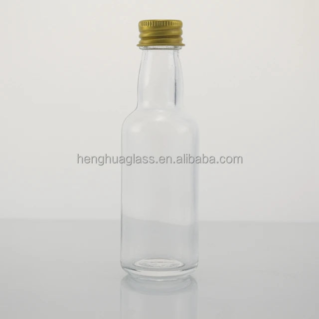 Wholesale Small Flint Glass Liquor Bottle 50ml Round Spirit Alcohol Gin Vodka Whiskey Rum Tequila Glass Bottle With Aluminum Cap