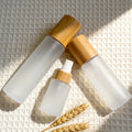 Cosmetic Packaging Bamboo Glass Bottle With Bamboo Pump Sprayer Lotion Cap  for Cosmetic Packaging