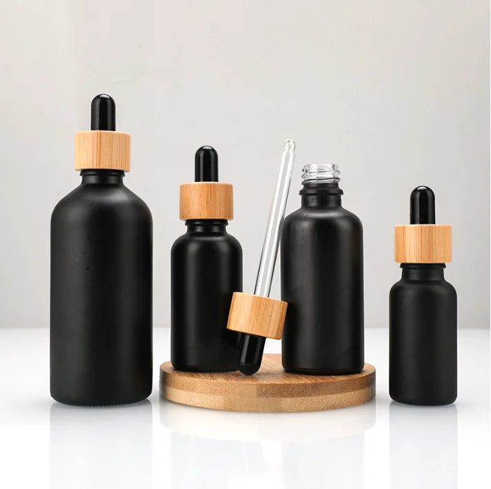 Wholesale Bamboo Collar Matte Black Glass Empty 30ml Cosmetic Essential Oil Packing Hair Oil Dropper Bottle