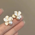 Korean White Shell Camellia Flower Pearl Stud Earrings for Women Elegant Temperament Statement Wedding Earrings