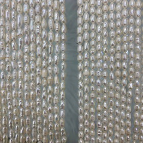 1A-4A Grade Price Drop Pearl String Wholesale Hot Sale Natural Freshwater Rice Shaped Pearls Strand