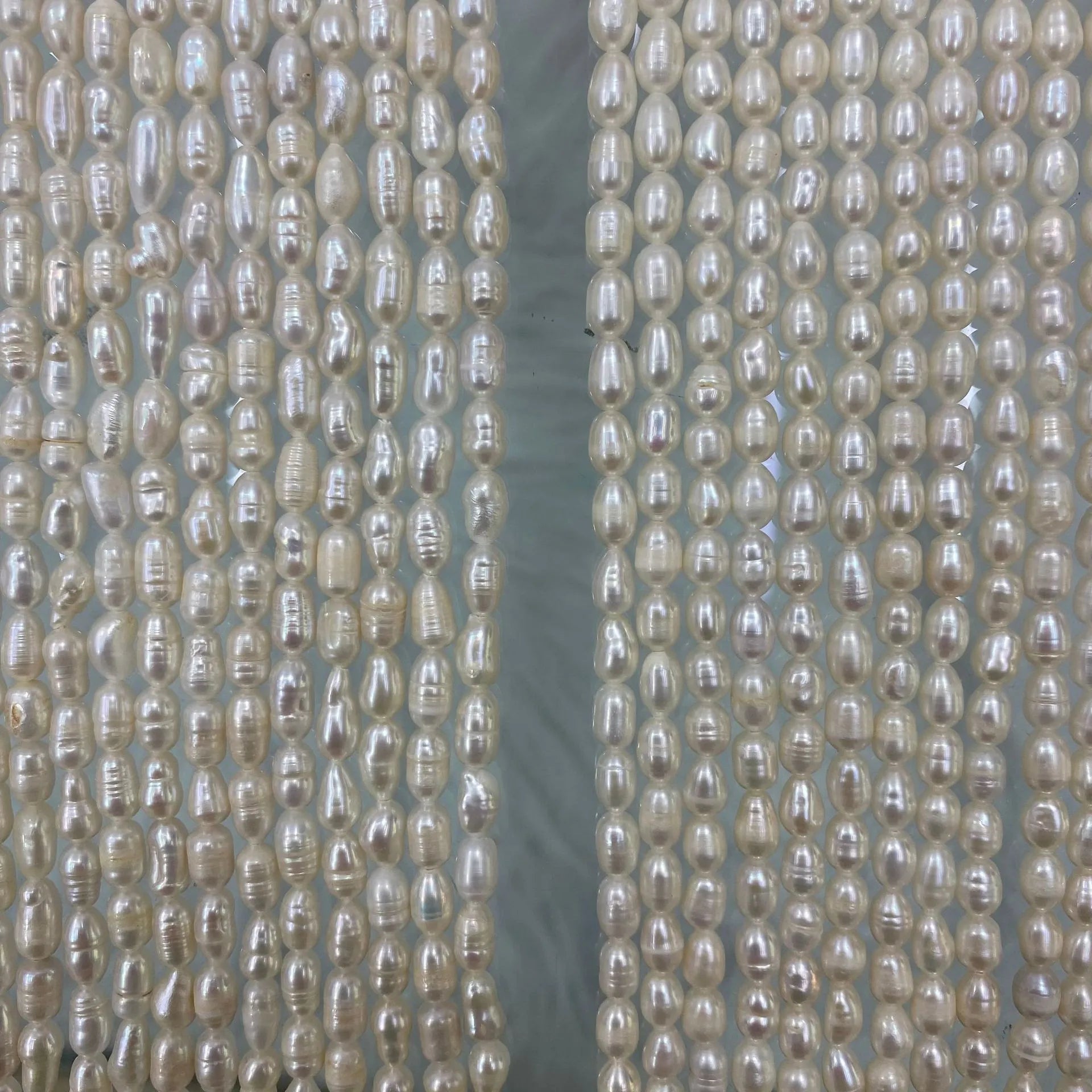 1A-4A Grade Price Drop Pearl String Wholesale Hot Sale Natural Freshwater Rice Shaped Pearls Strand